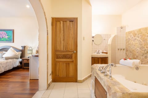 Junior Suite with Ocean View | Bathroom | Separate tub and shower, jetted tub, rainfall showerhead