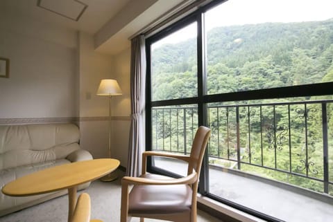 Twin Room, Half board, Non Smoking | In-room safe, desk, iron/ironing board, free WiFi