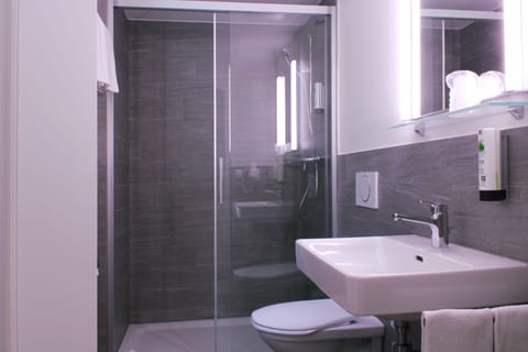 Hair dryer, heated floors, towels, soap