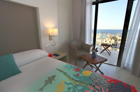 Double Room, Terrace, Sea View | Pillowtop beds, in-room safe, desk, laptop workspace