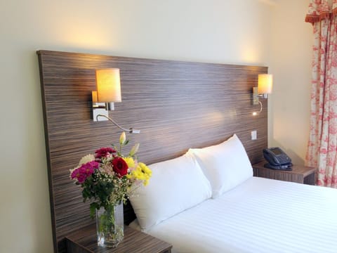 Standard Double Room | Pillowtop beds, individually decorated, desk, iron/ironing board