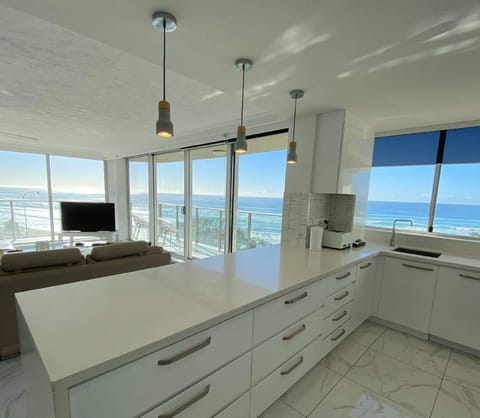 Apartment, 2 Bedrooms (Absolute Beach Front) | Private kitchen | Full-size fridge, microwave, oven, stovetop