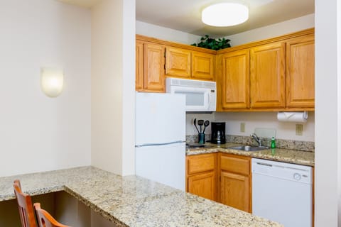 Suite, 2 Bedrooms, Kitchen | In-room safe, desk, laptop workspace, iron/ironing board