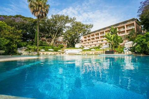 Indoor pool, seasonal outdoor pool, pool umbrellas, sun loungers