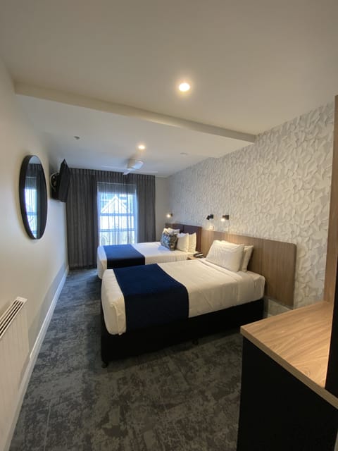 Deluxe Twin Room | Desk, iron/ironing board, free WiFi, bed sheets