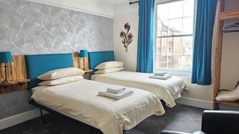 Twin Room | Individually decorated, desk, iron/ironing board, free WiFi