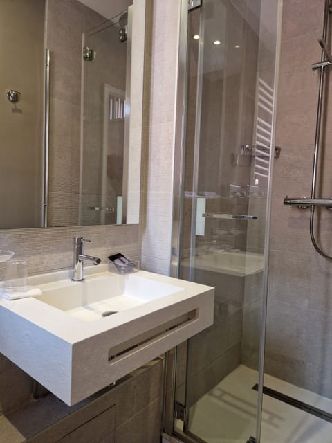 Standard Single Room | Bathroom | Shower, hair dryer, towels, soap