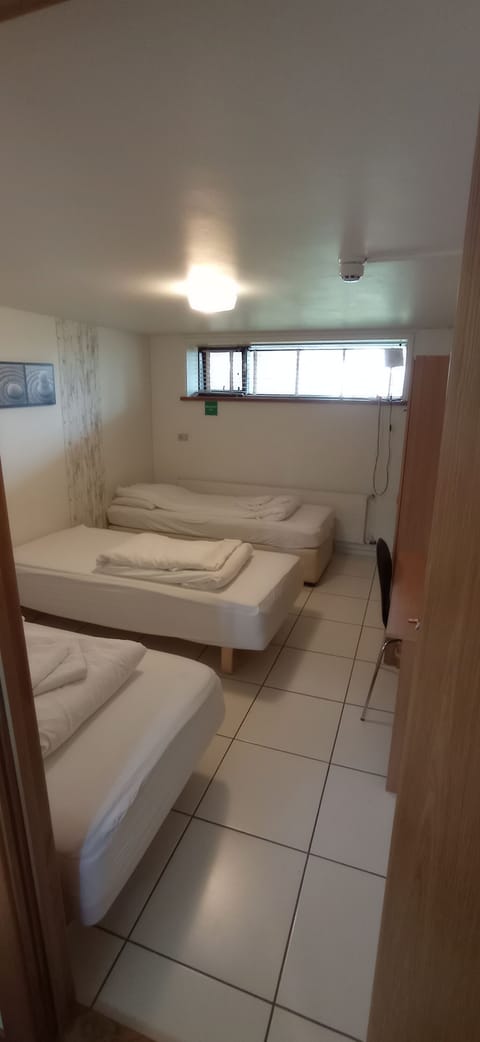 Triple Room, Private Bathroom | Pillowtop beds, free WiFi, bed sheets