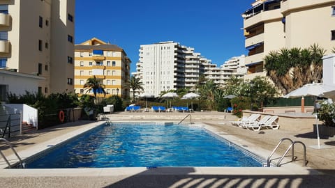 Outdoor pool, open 9:30 AM to 7:30 PM, pool umbrellas, sun loungers