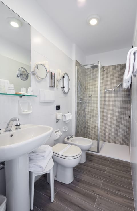 Combined shower/tub, eco-friendly toiletries, hair dryer, slippers