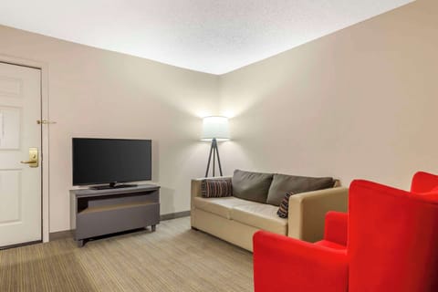 Suite, 1 Bedroom, Non Smoking | Desk, blackout drapes, iron/ironing board, free cribs/infant beds