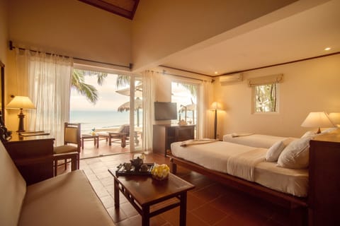 Bungalow, Beachfront | Premium bedding, minibar, in-room safe, desk