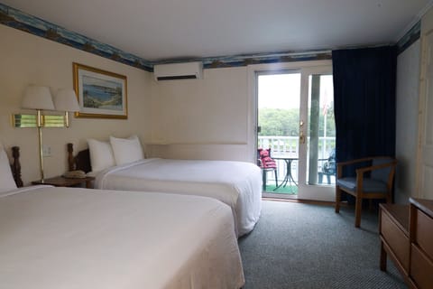 Standard Room, 1 Queen and 1 Full Bed, Waterfront | Individually decorated, individually furnished, iron/ironing board