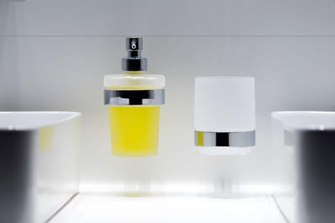 Shower, hair dryer, slippers, towels