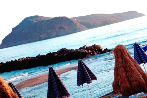 On the beach, sun loungers