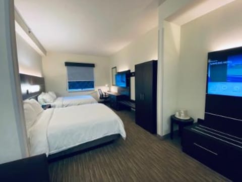 Suite, Multiple Beds | Desk, laptop workspace, blackout drapes, soundproofing