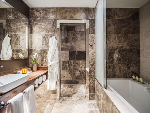 Premium Room | Bathroom | Combined shower/tub, eco-friendly toiletries, hair dryer, bathrobes