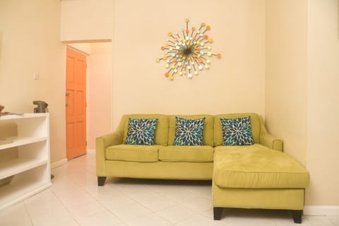 Apartment, 2 Bedrooms | Living area | 36-inch flat-screen TV with cable channels, TV