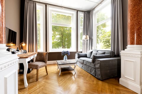 Deluxe Double Room, Alster View | Living area | Flat-screen TV