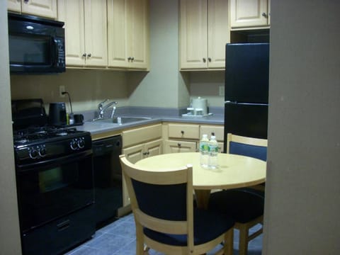 Studio Suite, 1 King Bed | Private kitchen | Fridge, microwave