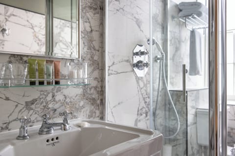 Family Room | Bathroom | Shower, designer toiletries, hair dryer, bathrobes