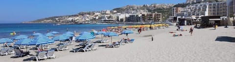 On the beach, beach towels, beach volleyball