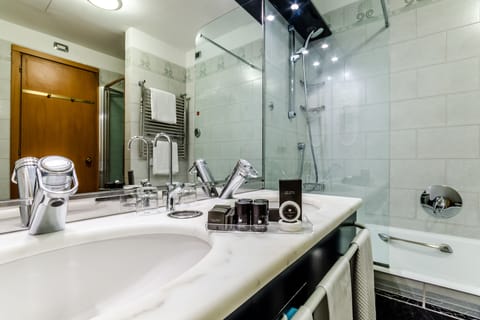 Combined shower/tub, free toiletries, hair dryer, bathrobes