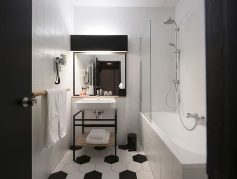 Designer toiletries, hair dryer, towels, soap