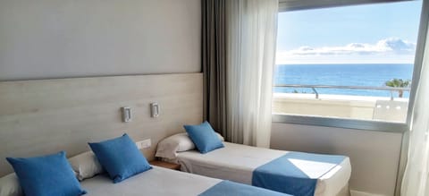 Deluxe Triple Room, Balcony, Sea View | Desk, free WiFi, bed sheets