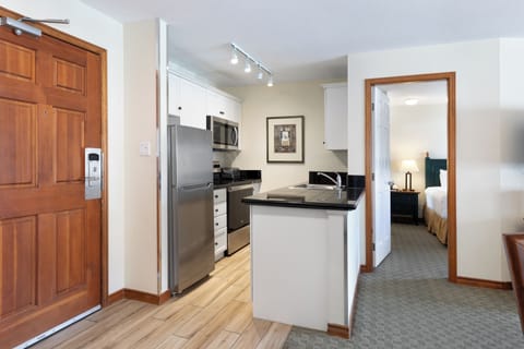 Condo, 2 Bedrooms (Unit 363) | Laptop workspace, iron/ironing board, rollaway beds, bed sheets