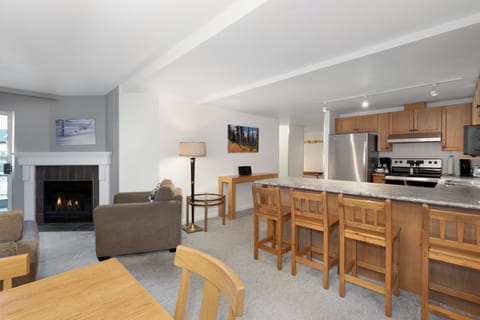 Condo, 3 Bedrooms (Unit 202) | Living area | 52-inch Smart TV with cable channels, fireplace