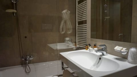 Standard Double or Twin Room | Bathroom | Combined shower/tub, hair dryer, bidet, towels