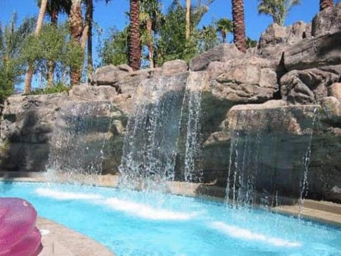 Outdoor pool, sun loungers, lifeguards on site