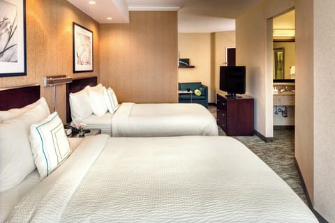 Suite, Multiple Beds | Hypo-allergenic bedding, desk, laptop workspace, iron/ironing board