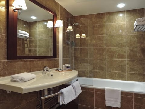 Select Comfort beds, free minibar items, in-room safe, blackout drapes