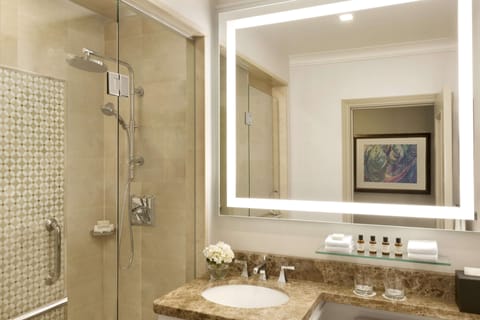 Combined shower/tub, designer toiletries, hair dryer, bathrobes