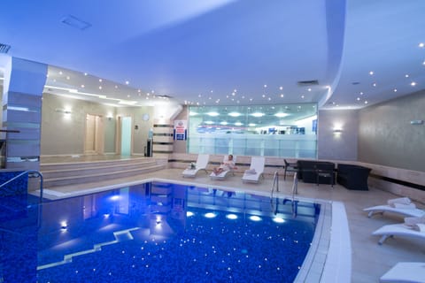 Indoor pool, open 10:00 AM to 8:00 PM, sun loungers