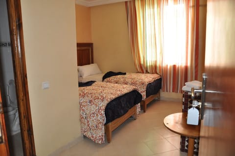 Double or Twin Room | Desk, blackout drapes, free WiFi