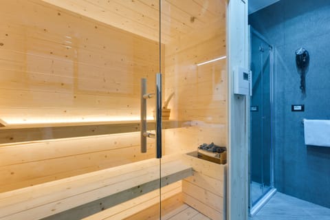 Luxury Suite, 1 Bedroom, Sauna | Memory foam beds, minibar, in-room safe, desk