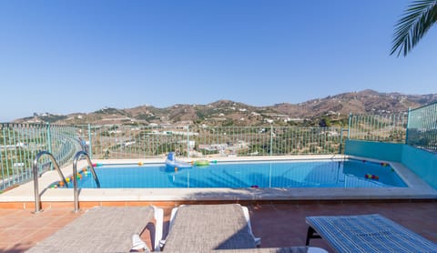 Seasonal outdoor pool, pool umbrellas, sun loungers