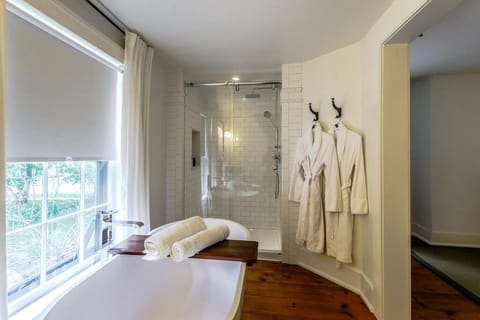 Premium Room, 1 King Bed, Fireplace | Bathroom | Hair dryer, bathrobes, towels, soap