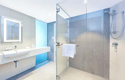 Standard Room, 1 Queen Bed (Extra Floor Space) | Bathroom | Shower, hydromassage showerhead, eco-friendly toiletries, hair dryer