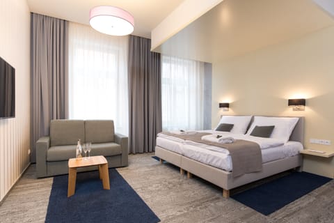 Junior Suite | Premium bedding, minibar, in-room safe, desk