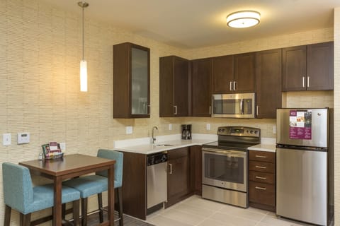 Suite, 1 Bedroom | Private kitchen | Full-size fridge, microwave, oven, stovetop