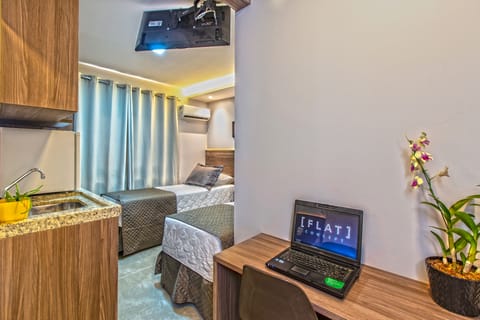 Economy Double or Twin Room, City View | Minibar, desk, laptop workspace, blackout drapes