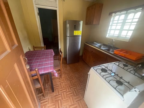 Standard Apartment, 4 Bedrooms, Smoking | Private kitchenette | Fridge, microwave, electric kettle, cookware/dishes/utensils