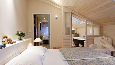 Family Suite, 2 Bedrooms | In-room safe, desk, iron/ironing board, free WiFi