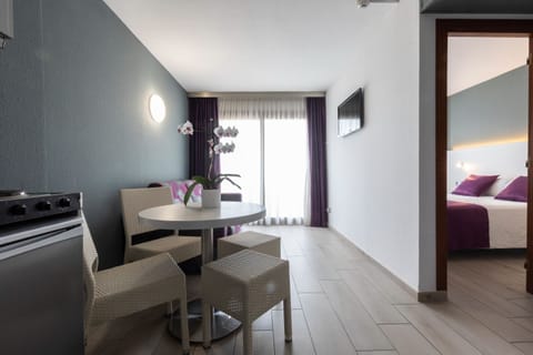 Family Apartment, 1 Bedroom, Balcony, City View | Desk, laptop workspace, free WiFi, bed sheets