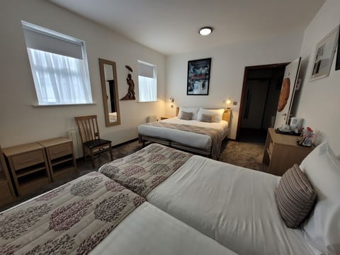 Standard Quadruple Room | Premium bedding, iron/ironing board, free WiFi, bed sheets