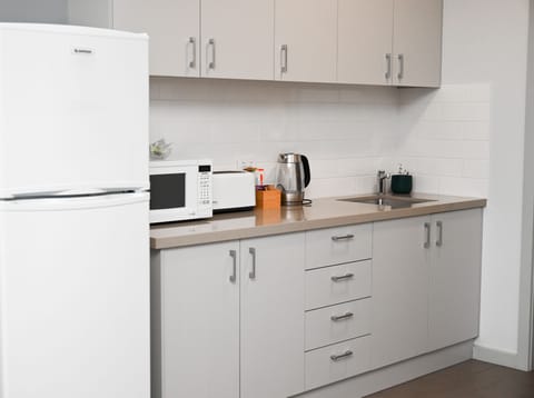 2 Bedroom Apartment | Private kitchen | Fridge, microwave, coffee/tea maker, electric kettle